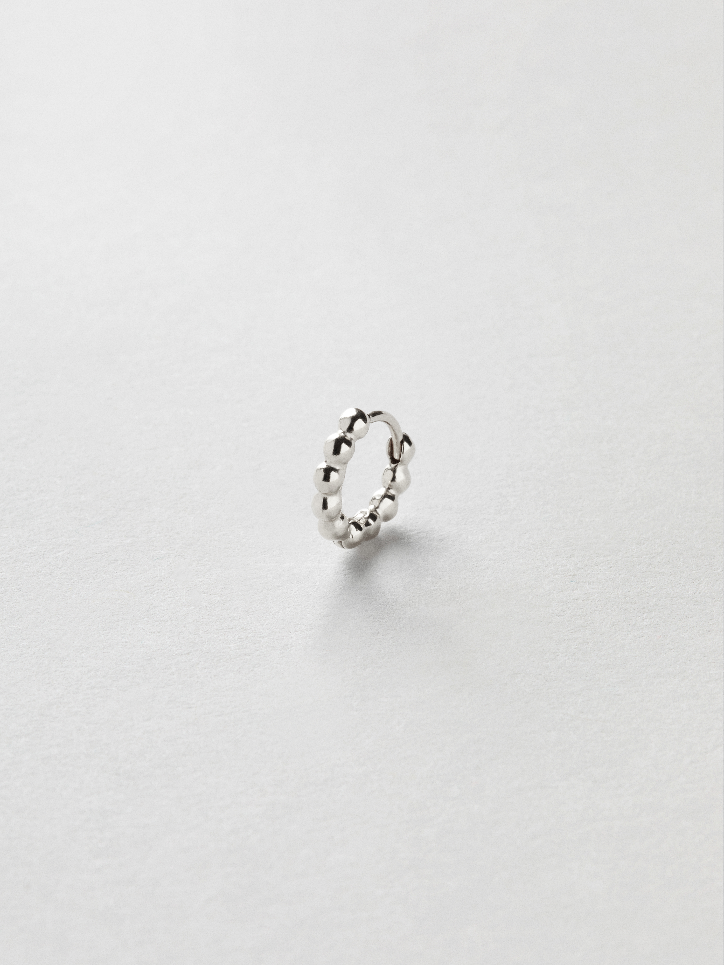 Ball Huggie Piercing